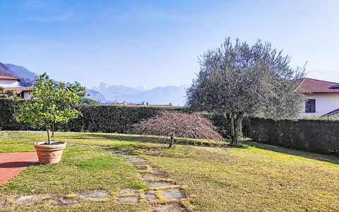Casa Molgisio: Landscape, Garden, Groundcover, Lawn, Landscaping, Yard, Park, Backyard, Walkway, Farmhouse