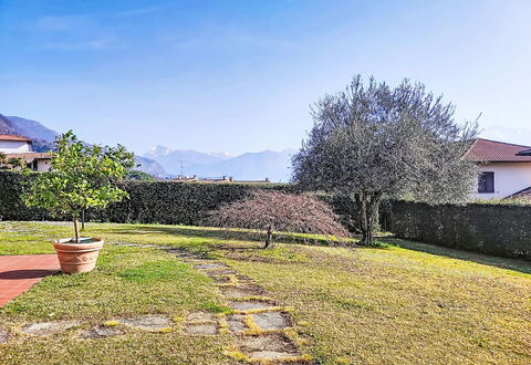 Casa Molgisio: Landscape, Garden, Groundcover, Lawn, Landscaping, Yard, Park, Backyard, Walkway, Farmhouse