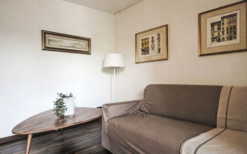 Etrusco Apartment: Furniture, Interior Design, Flooring, Wall, Floor, Wood, Couch, Room, Living Room, Picture Frame