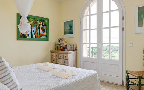 Villa Muneca: Furniture, Interior Design, Floor, Flooring, Wood, Bedroom, Bed, Room, Textile, Home