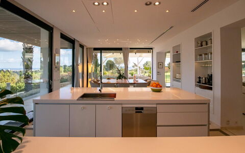 Villa the Marvel: Kitchen, Interior Design, Furniture, Countertop, Flooring, Floor, Wood, Ceiling, Kitchen Appliance, Cabinetry