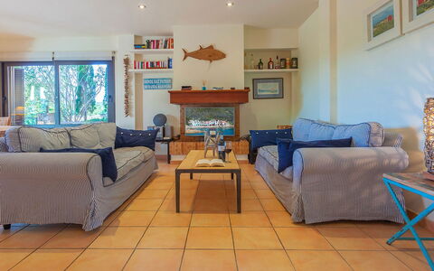 Villa Tamariu: Furniture, Interior Design, Flooring, Couch, Floor, Wood, Room, Table, Living Room, Lighting