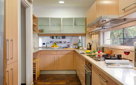 Villa Cassiopea: Kitchen Appliance, Kitchen, Countertop, Cabinetry, Furniture, Interior Design, Major Appliance, Flooring, Wood, Home Appliance