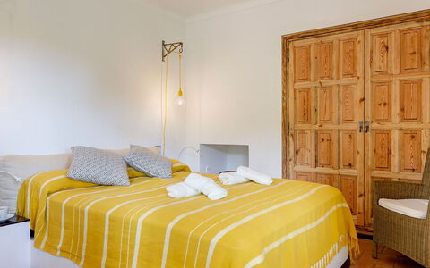 Villa Cassiopea: Furniture, Bed, Interior Design, Bedroom, Wall, Floor, Bedding, Flooring, Bed Sheet, Wood