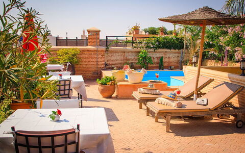 Riad Ikram: Swimming Pool, Furniture, Outdoor Furniture, Resort, Umbrella, Chair, Sunlounger, Flowerpot, Houseplant, Eco Hotel
