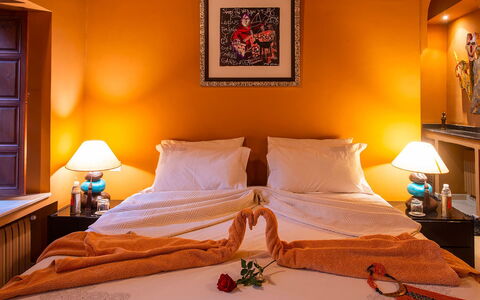 Riad Ikram: Furniture, Interior Design, Bed, Bedroom, Orange, Bed Sheet, Room, Bedding, Floor, Textile