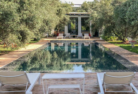 Villa Susan: Swimming Pool, Estate, Garden, Resort, Reflection, Shade, Chair, Outdoor Furniture, Reflecting Pool, Landscaping