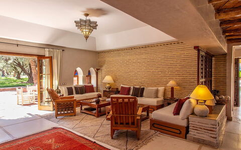 Villa Royale: Furniture, Flooring, Wood, Floor, Couch, Interior Design, Chair, Living Room, Table, Ceiling