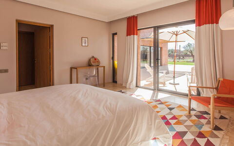 Villa Delizia: Furniture, Floor, Flooring, Interior Design, Wood Stain, Chair, Resort, Shade, Hardwood, Swimming Pool