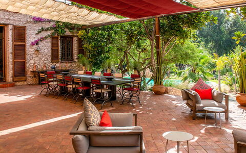 Le Jardin Mogador: Furniture, Chair, Outdoor Furniture, Table, Outdoor Table, Garden, Resort, Shade, Backyard, Flowerpot