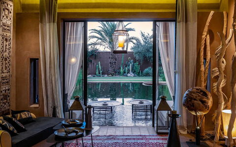 Dar Moon: Interior Design, Resort, Living Room, Eco Hotel, Hotel, Design, Light Fixture, Houseplant, Chair