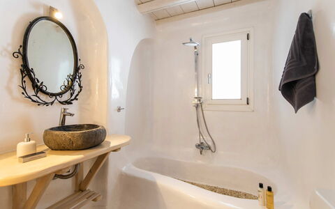 Villa Apollonia: Wall, Plumbing Fixture, Bathtub, Interior Design, Flooring, Bathroom, Floor, Tap, Plumbing, Home