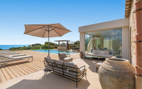 Villa Smeralda: Resort, Coastal And Oceanic Landforms, Coast, Estate, Sea, Outdoor Furniture, Swimming Pool, Shore, Tropics, Umbrella