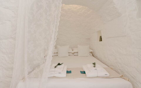Trulli Fontana: Bedroom, Bed, Bedding, Pillow, Natural Material, Bed Sheet, Linens, Throw Pillow, Mattress, Bed Frame