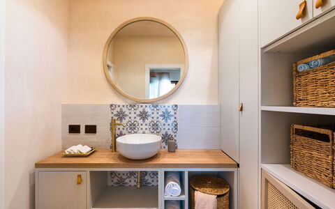 Villa Paprika: Interior Design, Flooring, Plumbing Fixture, Bathroom Cabinet, Floor, Bathroom, Cabinetry, Bathroom Sink, Home, Furniture