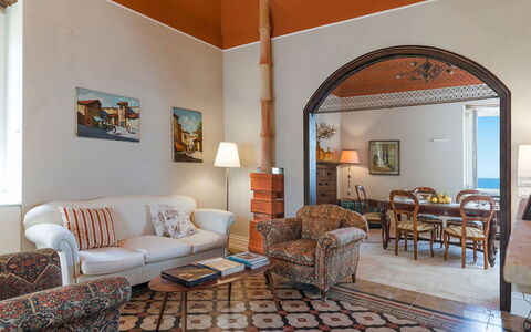 Villa Milo: Furniture, Interior Design, Wall, Flooring, Floor, Wood, Ceiling, Room, Couch, Living Room