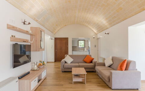 Villa Il Gelsomino: Furniture, Interior Design, Flooring, Wood, Couch, Ceiling, Floor, Room, Lighting, Living Room