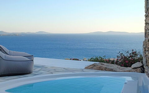 The Rose Suite with Jacuzzi: Blue, Water, Swimming Pool, Outdoor Furniture, Sea, Coastal And Oceanic Landforms, Coast, Ocean, Umbrella, Resort