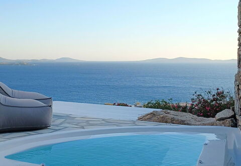 The Rose Suite with Jacuzzi: Blue, Water, Swimming Pool, Outdoor Furniture, Sea, Coastal And Oceanic Landforms, Coast, Ocean, Umbrella, Resort