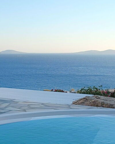 The Rose Suite with Jacuzzi: Blue, Water, Swimming Pool, Outdoor Furniture, Sea, Coastal And Oceanic Landforms, Coast, Ocean, Umbrella, Resort