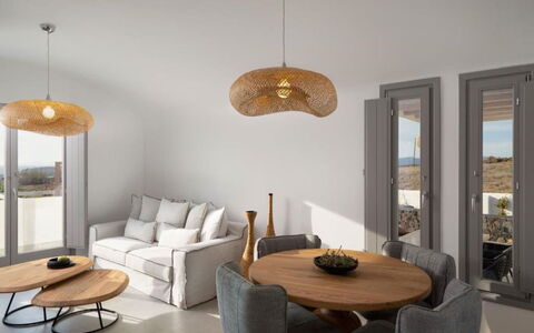 Golden Sunset Villa: Furniture, Interior Design, Light Fixture, Natural Material, Ceiling, Chair, Living Room, Hardwood, Lamp, Wood Stain