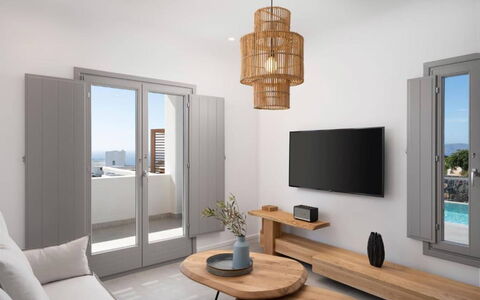 Villa Akrotiri: Furniture, Interior Design, Apartment, Flooring, Floor, Lighting, Home, Room, Chair, Living Room