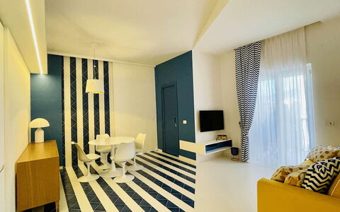 Nole 1: Interior Design, Flooring, Floor, Ceiling, Furniture, Room, Apartment, Living Room, Chair, Paint