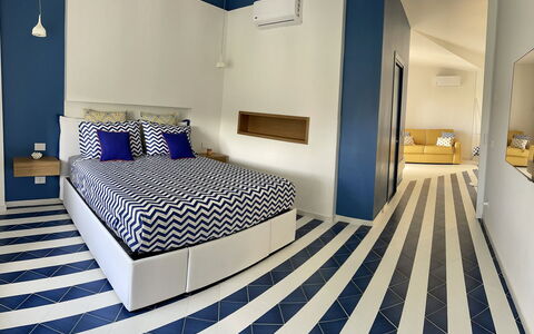 Nole 1: Interior Design, Furniture, Flooring, Floor, Bedroom, Ceiling, Textile, Room, Lighting, Bed