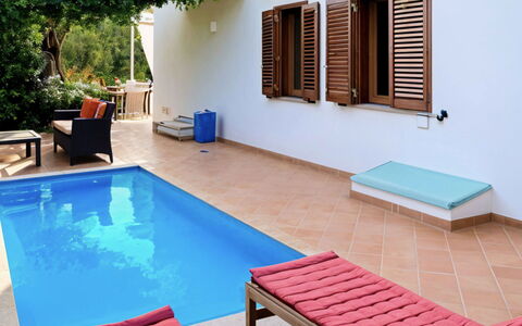 Villa Ava: Furniture, Swimming Pool, Outdoor Furniture, Leisure, Resort, Floor, Eco Hotel, Shade, Wood Stain, Chair