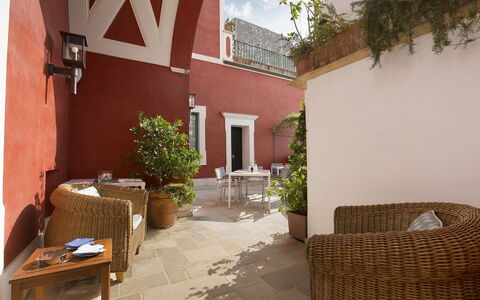 Villa Chiara: Wall, Furniture, Flooring, Interior Design, Home, Chair, Apartment, Houseplant, Living Room, Flowerpot