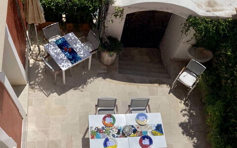Villa Chiara: Furniture, Outdoor Furniture, Chair, Flowerpot, Outdoor Table, Shade, Garden, Courtyard, Houseplant, Yard