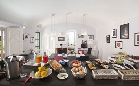 Villa Chiara: Interior Design, Furniture, Ceiling, Lighting, Table, Room, Light Fixture, Food, Serveware, Chair