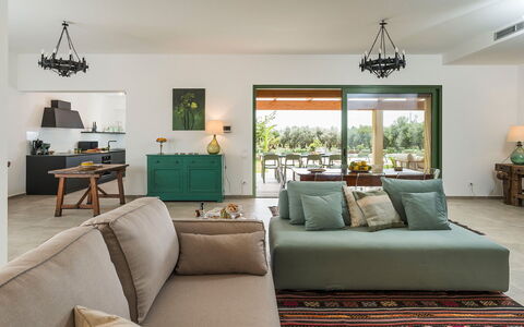 Villa Clemente: Furniture, Interior Design, Flooring, Couch, Wood, Table, Floor, Living Room, Room, Chair