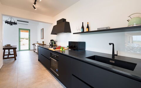 Villa Clemente: Kitchen, Countertop, Interior Design, Cabinetry, Kitchen Appliance, Flooring, Wood, Ceiling, Lighting, Tap