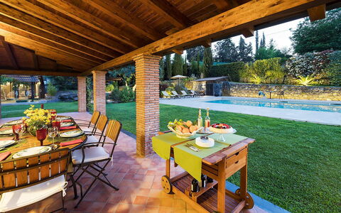 Villa Monte Serra: Furniture, Table, Swimming Pool, Resort, Chair, Interior Design, Kitchen & Dining Room Table, Eco Hotel, Outdoor Furniture, Garden