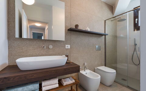 Villa Camporeale: Bathroom, Interior Design, Flooring, Plumbing Fixture, Floor, Wall, Bathroom Sink, Sink, Mirror, Wood