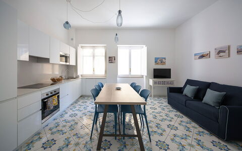Maison Maiori: Flooring, Interior Design, Floor, Furniture, Wood, Ceiling, Room, Lighting, Table, Home