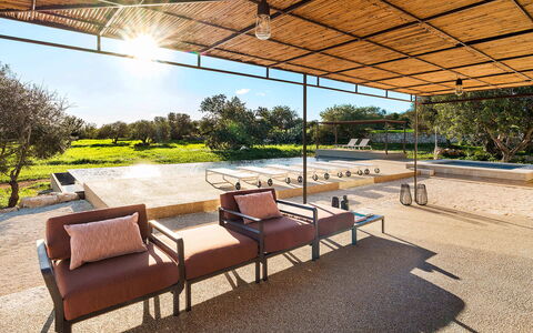 Villa del Sole: Shade, Garden, Landscaping, Outdoor Structure, Chair, Outdoor Furniture, Eco Hotel, Pavilion, Backyard