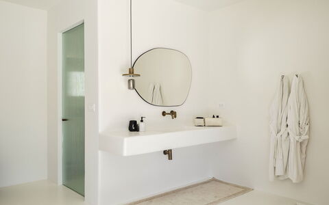 Villa Medea: Wall, Plumbing Fixture, Interior Design, Bathroom, Bathroom Sink, Flooring, Tap, Floor, Mirror, Light Fixture