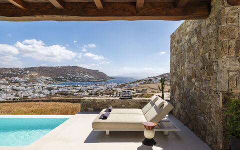 Villa Medea: Flooring, Furniture, Floor, Chair, Resort, Couch, Living Room, Shade, Natural Material