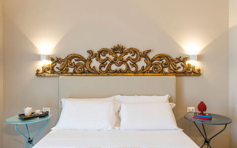 Villa Monica: Wall, Interior Design, Bedroom, Bed Sheet, Lighting, Bedding, Linens, Bed, Home, Bed Frame
