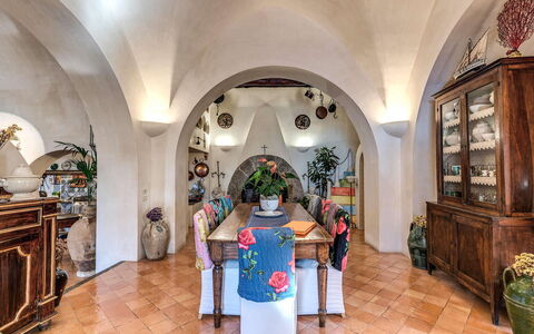 Villa Madonna di Costantinopoli: Interior Design, Flooring, Dining Room, Flowerpot, Houseplant, Chair, Kitchen & Dining Room Table, Vault, Tile, Floral Design