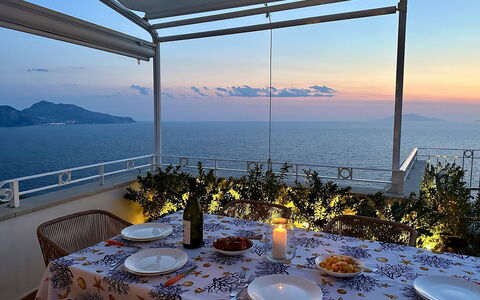 Casa Oscar: Body Of Water, Furniture, Table, Sea, Coastal And Oceanic Landforms, Coast, Chair, Ocean, Resort, Shade