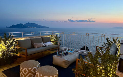 Casa Oscar: Body Of Water, Furniture, Sea, Outdoor Furniture, Table, Coastal And Oceanic Landforms, Coast, Chair, Ocean, Flowerpot