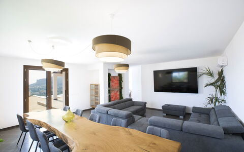 Villa Priscilla: Furniture, Interior Design, Wood, Flooring, Ceiling, Table, Floor, Lighting, Room, Living Room