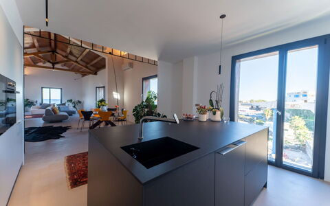 Iris House: Interior Design, Flooring, Floor, Furniture, Home, Countertop, Kitchen, Lighting, Ceiling, Kitchen & Dining Room Table