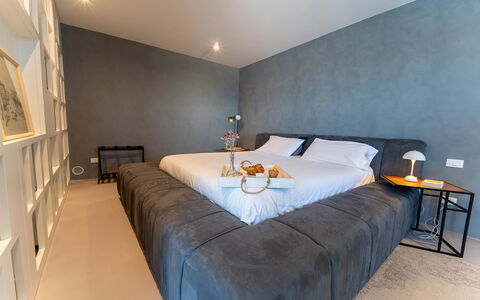 Iris House: Furniture, Bed, Interior Design, Floor, Bedroom, Flooring, Wall, Bedding, Bed Sheet, Wood