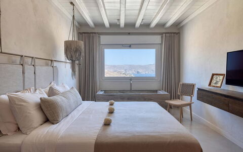 Villa Mitos: Bedroom, Bed, Bedding, Furniture, Bed Sheet, Interior Design, Linens, Bed Frame, Floor, Pillow
