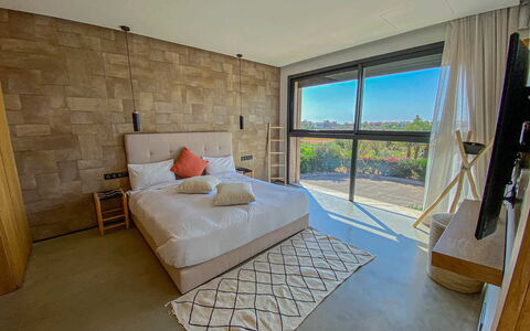Villa Inaya: Furniture, Flooring, Floor, Bedroom, Apartment, Ceiling, Wood Flooring, Bed, Hardwood, Chair