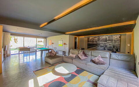 Villa Inaya: Flooring, Interior Design, Floor, Ceiling, Wood, Furniture, Lighting, Couch, Room, Living Room